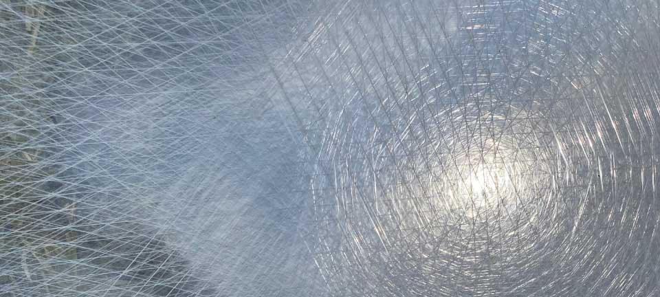 protection grid supporting bale tightness